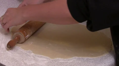 Rolling Top Pie Crust on to Pie Stock Footage 33611692