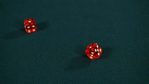 Rolling two red dice and getting same numbers one on both, Snake Eyes Video stock 221075416