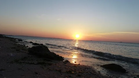 Rolling waves and tropical sunset Stock Footage 89903471