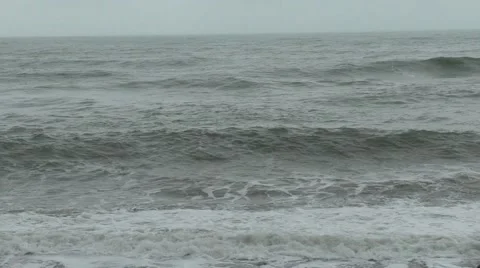 Rolling waves on a beach Stock Footage 49640468