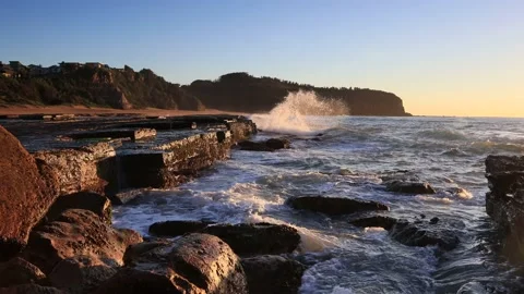 Rolling waves in fast motion on Sydney Northern beaches at sunrise in 4k. Stock Footage 158711333