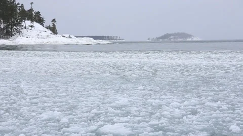 Rolling waves in the ice chunks Stock Footage 37231751