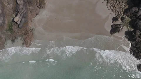 Rolling waves on a sand beach, Guernsey Stock Footage 288743167