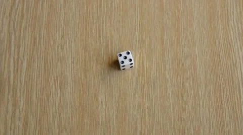 Rolling White Dice Stock Footage 68980867