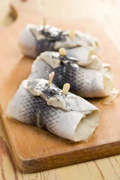 Rollmops on kitchen table Foto stock
