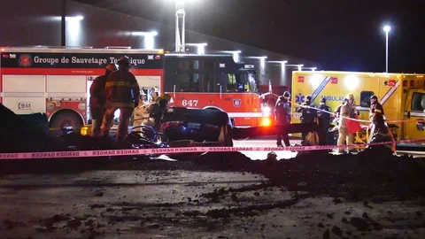 Rollover car accident during windy night Stock Footage 102237448