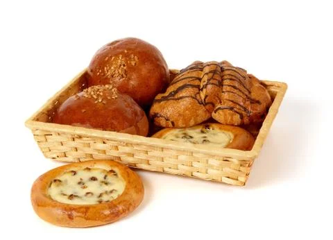 Rolls and buns in the basket Stock Photos