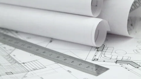 Rolls of architectural drawings &amp; tools Stock Footage 622307