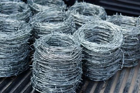 Rolls of barbed wire Stock Photos