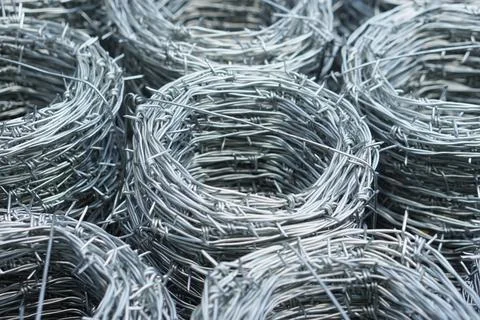 Rolls of barbed wire. Stock Photos