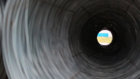 Rolls of barbed wire . wound wire at the factory. Iron proloco wound into large Stock Footage 94898796