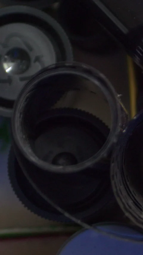 Rolls Of Black And White Negative Film  vertical video Stock Footage 255805953