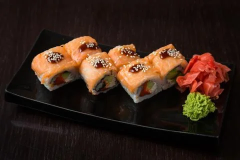 Rolls on a black plate Foto stock