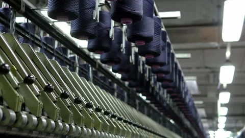 Rolls of Black Wool Yarn Prepared for Textile Manufacturing Stock Footage 328643567
