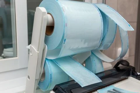 Rolls of blue transparent sterilization packaging material with indicators Stock Photos