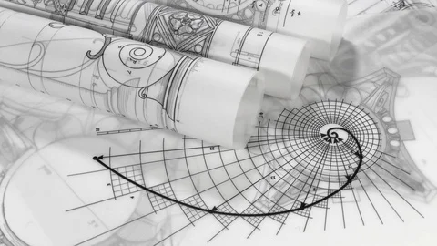 Rolls of blueprints - drawing of the golden section and drawings of antique deco Stock Footage 93664537