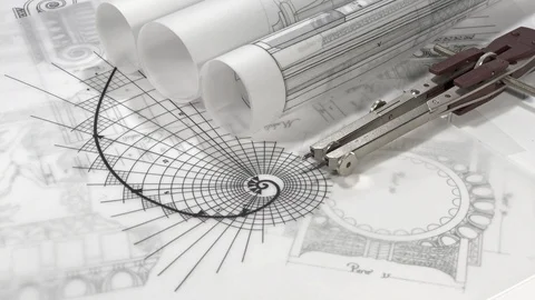 Rolls of blueprints - drawing of the golden section Stock Footage 94459935