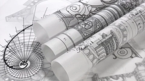Rolls of blueprints - drawing of the golden section Stock Footage 94529281