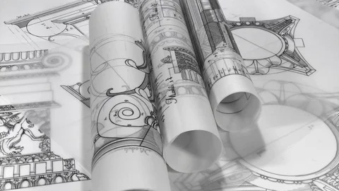 Rolls of blueprints - drawings of antique decorative elements Stock Footage 93664853