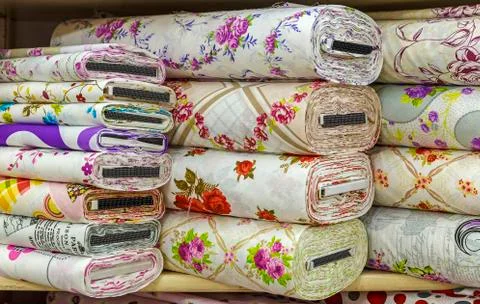 Rolls of colored fabrics Stock Photos