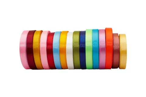 Rolls of colored satin ribbons Stock Photos