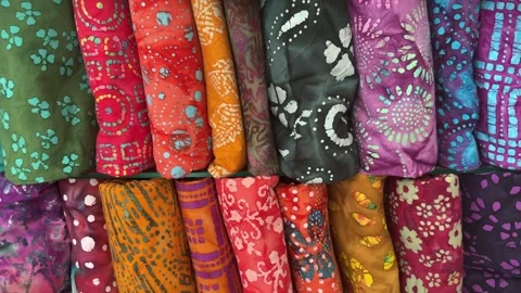 Rolls of colorful hand dyed batik Stock Footage 281850451
