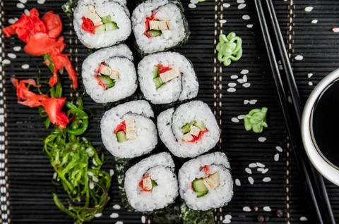 Rolls on a dark background Stock Photos