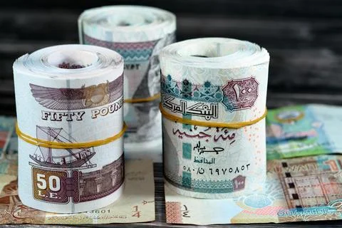 Rolls of Egypt money banknote bills of 100 and 50 EGP LE one hundred Egypti.. Stock Photos