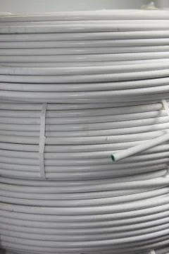 Rolls of electrical cable and conduit Stock Photos