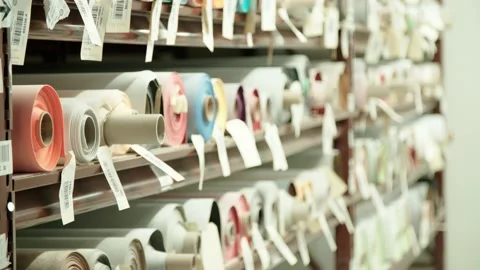 Rolls of fabric in store - multishot Stock Footage 134617646