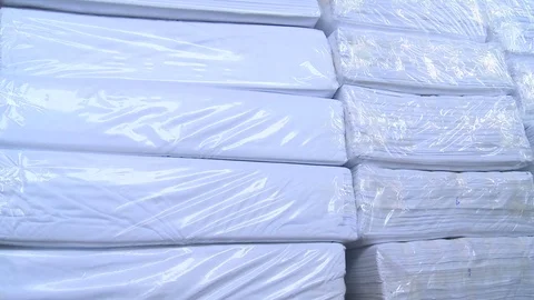Rolls of fabrics are stored in the raw materials warehouse, warehouse of fabrics Stock Footage 81238041