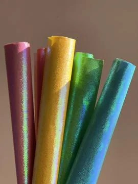 Rolls of multi-colored bright paper Stock Photos