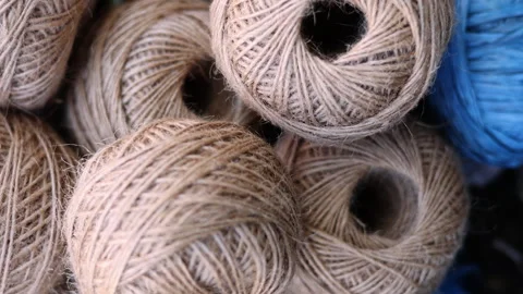 Rolls of natural hemp wire for parcel twine, string, packing or diy Stock Footage 253385107