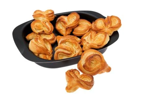 Rolls in the pan on white background Stock Photos