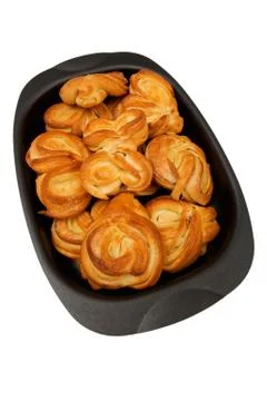 Rolls in the pan on white close up Foto stock