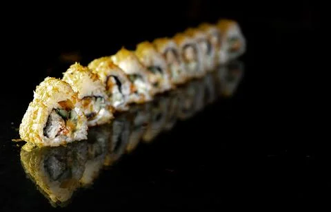 Rolls in perspective, isolated on black background Stock Photos