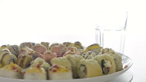 Rolls on a plate. Side view. Video stock 204953726