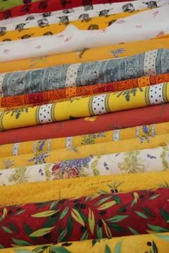 Rolls of provencal textile Stock Photos