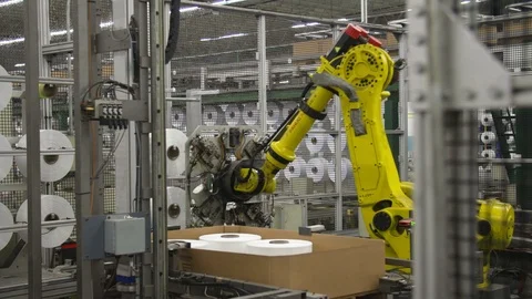 Rolls of recycled plastic threads with robot arm Stock Footage 93531302