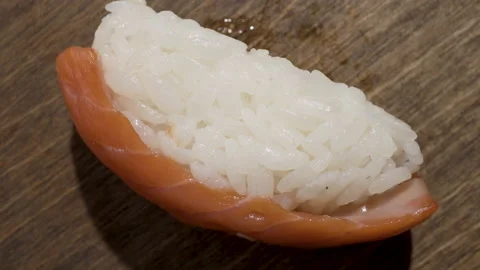 Rolls with rice and fish close-up Видео 135235047