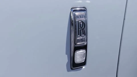 Rolls Royce logo emblem on side of car 動画素材 168752134