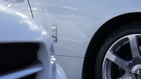 Rolls Royce logo emblem on side of car 動画素材 168752139