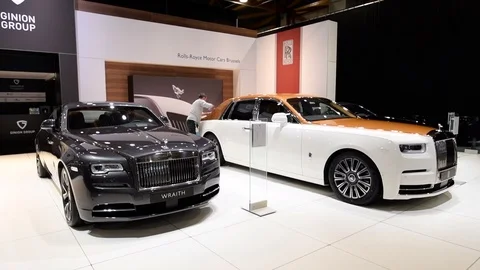 Rolls Royce Phantom (Rolls-Royce Phantom VIII) and Rolls-Royce Wraith Stock Footage 87834626