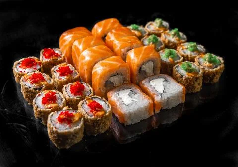 Rolls set on a black background. kinds roll for design your menu Stock Photos