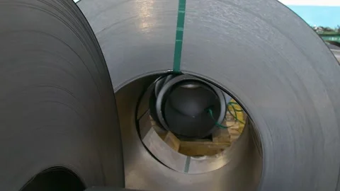 Rolls of sheet steel for press forming of products in the factory. Video stock 276962912