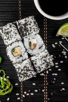 Rolls with tuna on a dark background Stock Photos