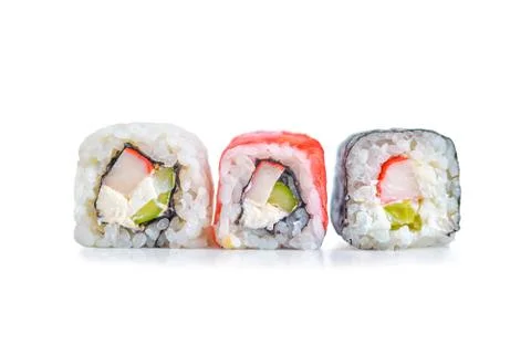 Rolls on a white isolated background, close-up. Japanese restaurant menu Stock Photos