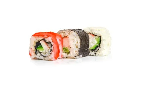 Rolls on a white isolated background, close-up. Japanese restaurant menu Stock Photos