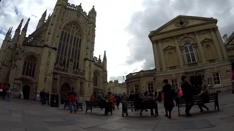 The Roman Baths and The Bath Abbey in city of Bath, Somerset, England, UK Stock Footage 77886864