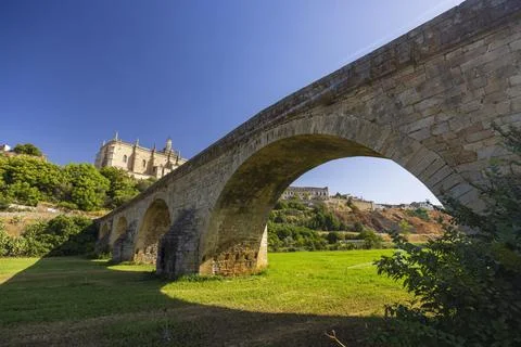 Roman Bridge and Cathedral, Coria, Caceres province, Extremadura, Spain Stock Photos